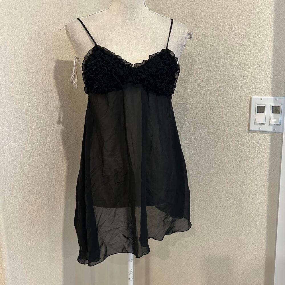 Rampage black sheer slip with ruffles. Size medium